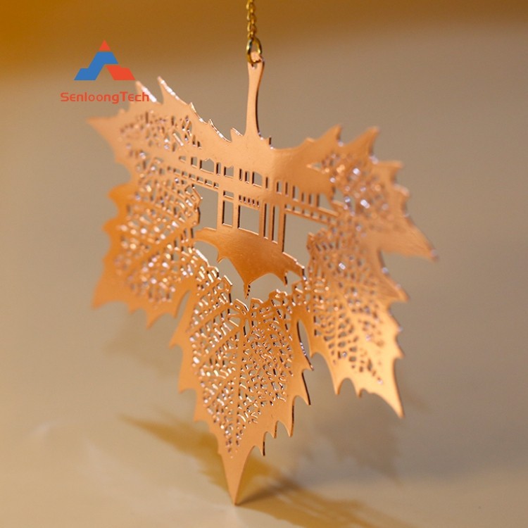 Embossed maple leaf metal bookmark